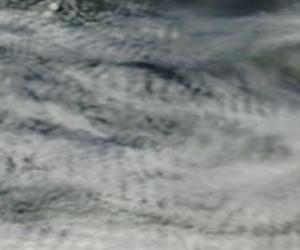 Signature of a weather weapon. A circular indentation in cloud to west of South Island